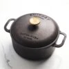 Smithey Ironware 5.5 Qt. Dutch Oven -Le Creu Grill Shop Dutch Oven Angle 720x e2a4a212 1234 4235 b6d3 e2a433be0323